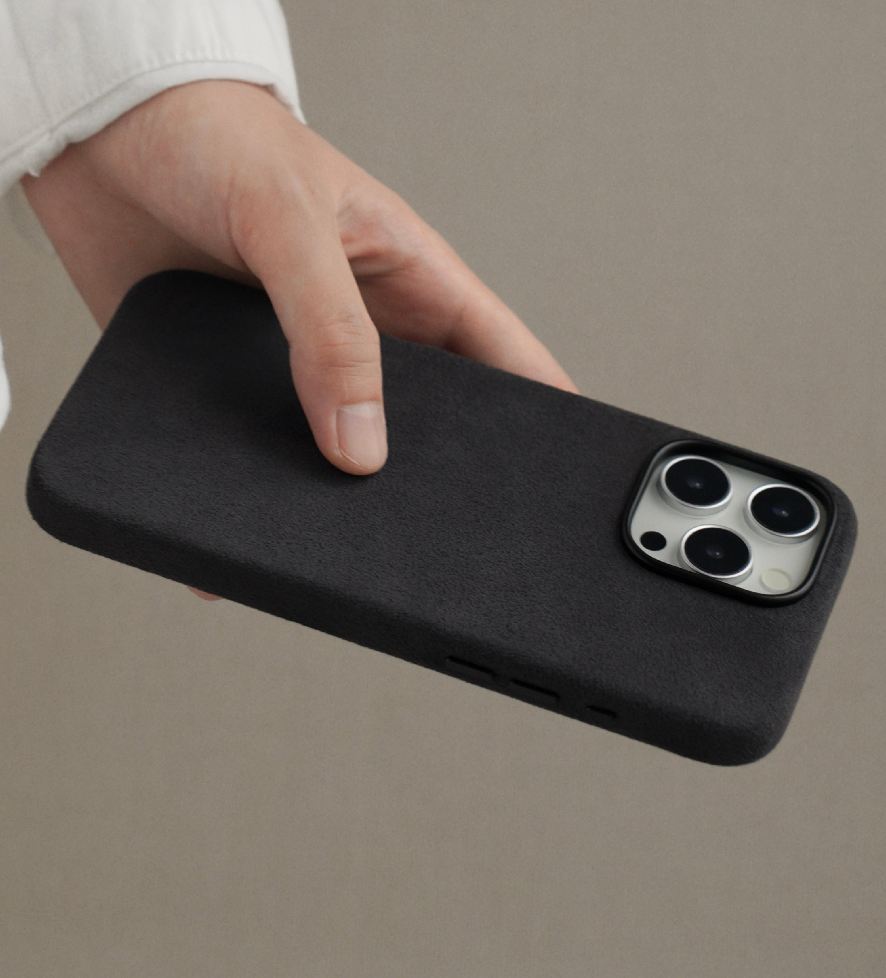 Cantaracase iPhone 16 Pro Alcantara case in hand