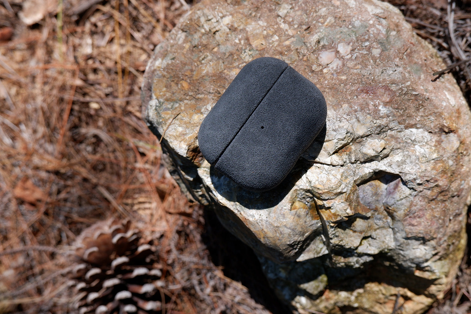 Cantaracase Alcantara AirPods Pro 3 case in natural light