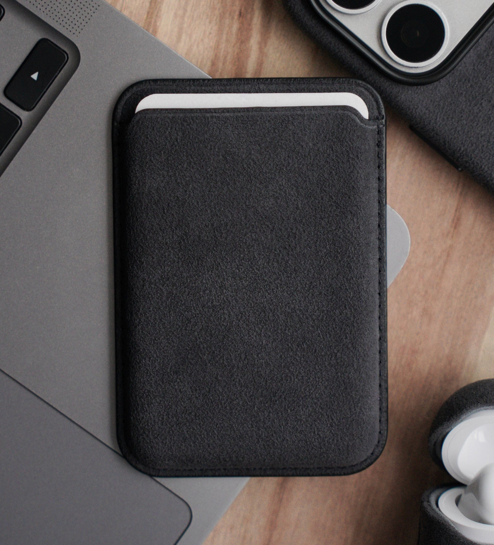 Cantaracase Alcantara MagSafe wallet with iPhone and AirPods