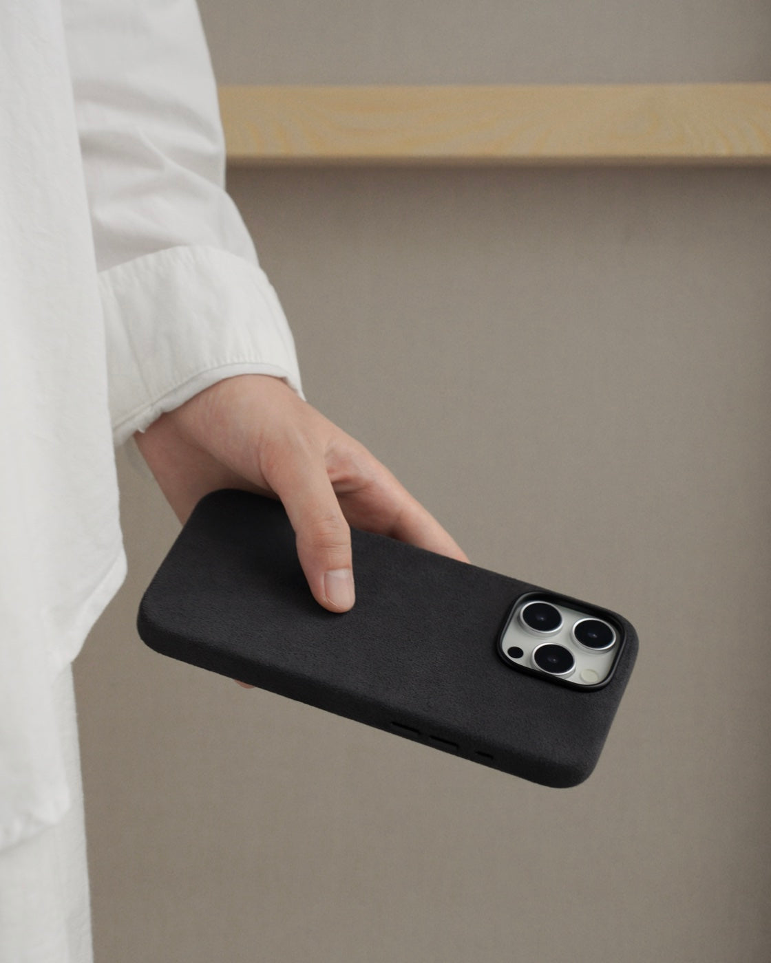 iPhone 16 Alcantara case in Deep Space Grey