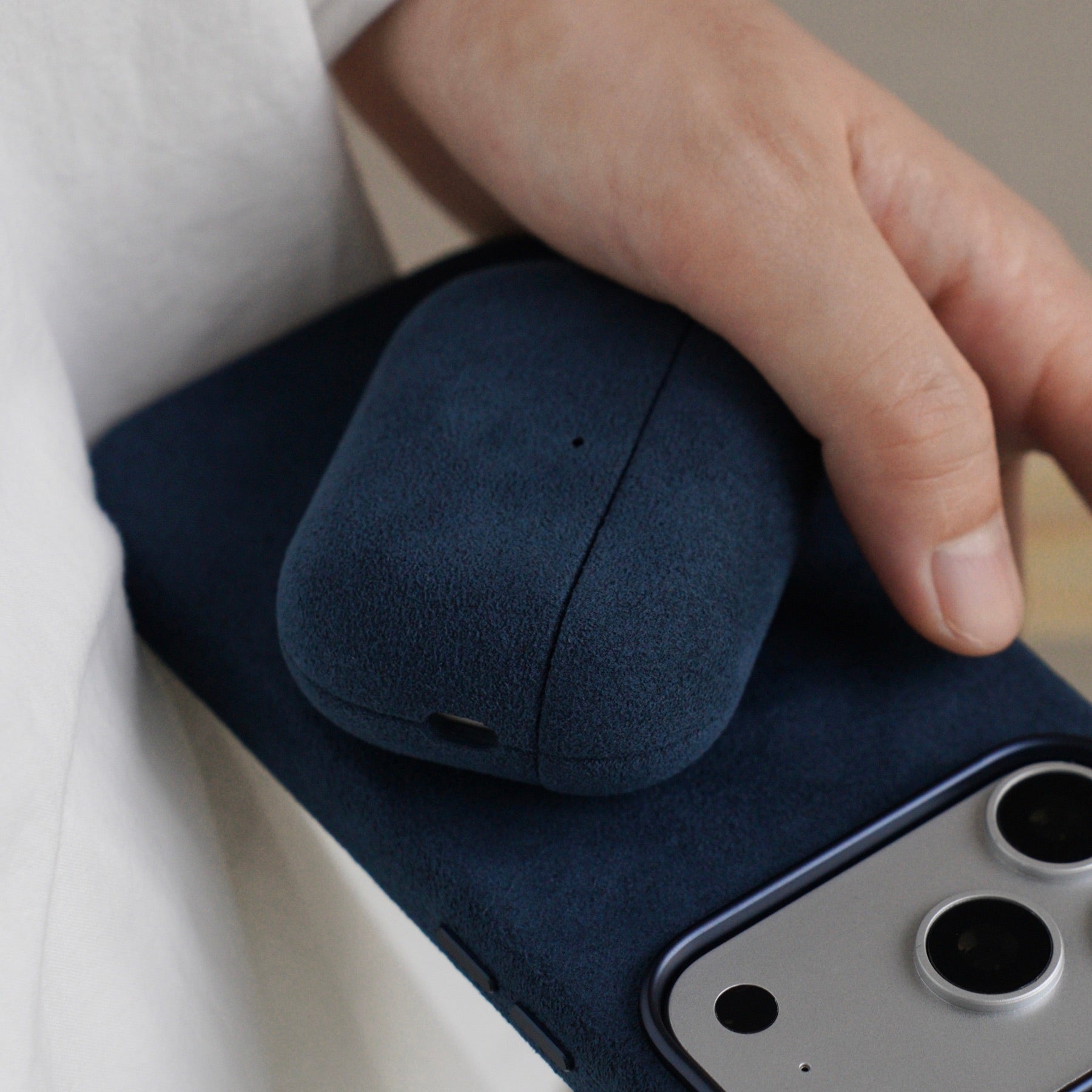 Cantaracase Alcantara iPhone case and AirPods case in daily carry